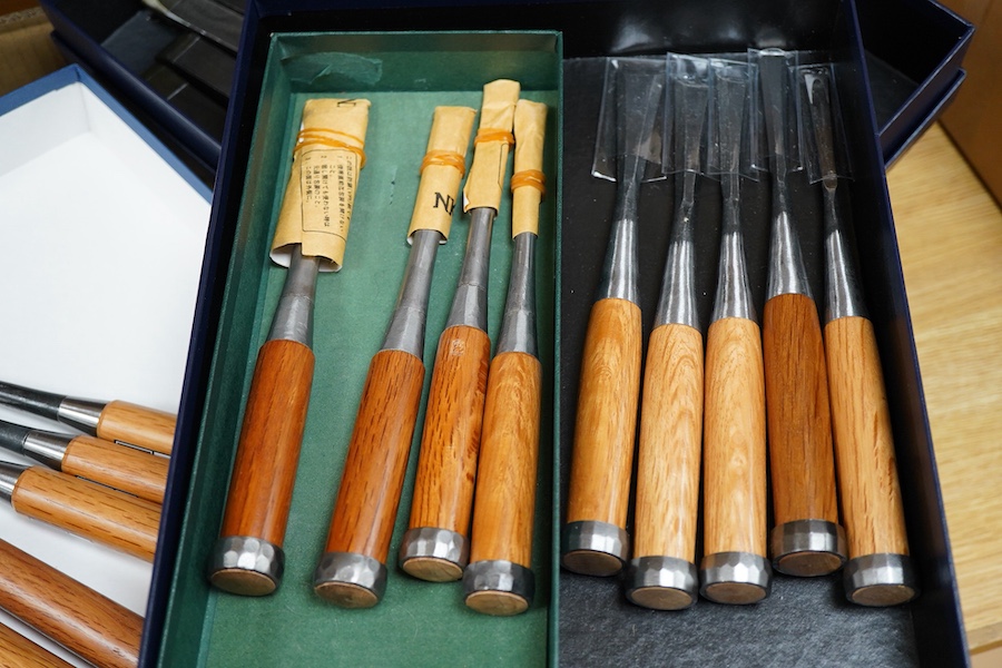 Four sets of Japanese chisels, including a set of six Kote Nomi cranked neck trowel chisels, a set of seven mortise chisels, and two other cabinetmakers sets (22 in total), plus two Japanese hammers/mallets